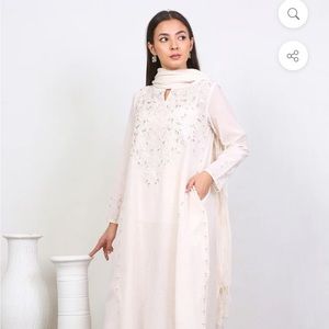 Elegant and lovely three piece Pakistani suit